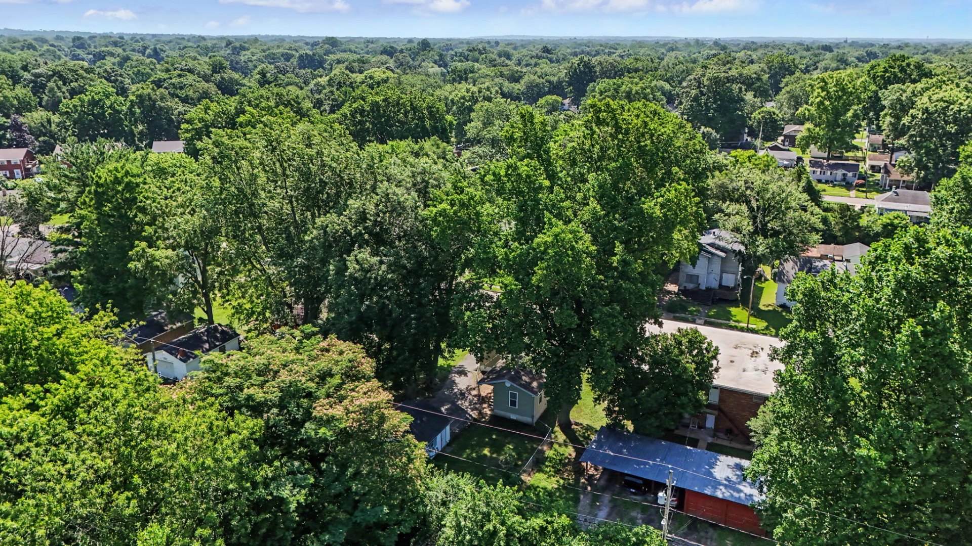Belleville home, aerial view of neighborhood setting